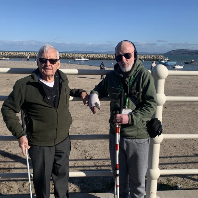 A photo of Graham, left, with fellow blind veteran Dean