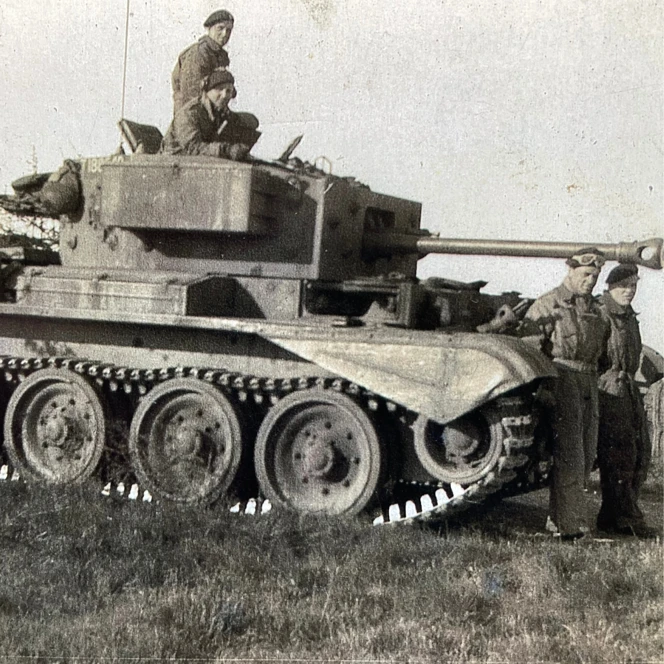 Richard in the driving seat of a tank