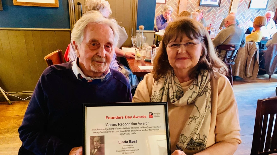 Photo of Linda Best, carer for husband Tony receiving her Carers Recognition Award