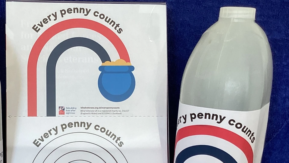 A milk carton with the Every Penny Counts pre-coloured label on it along side a print out of the colour and black and white label templates.