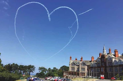 Heart Shaped Contrails Over The Llandudno Centre