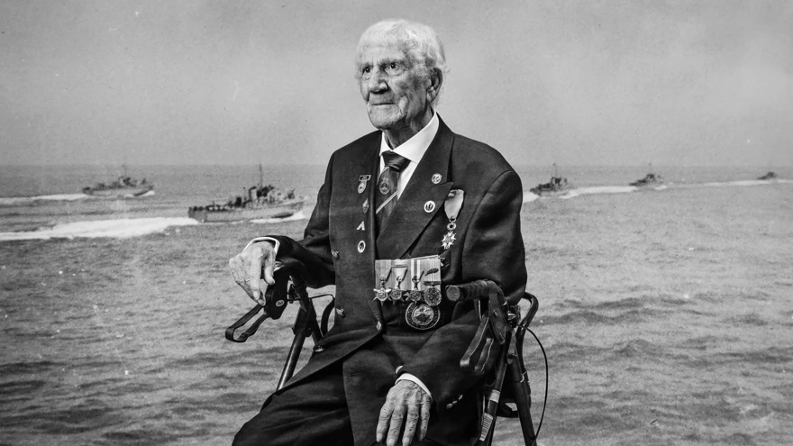 A black and white portrait of blind veteran George, overlaid on a scene from D-Day