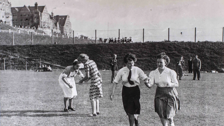 Photo of Gwen, far right, taking part in an egg and spoon race at Church Stretton