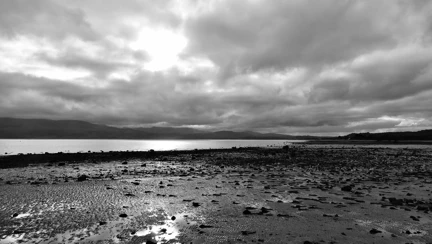 Black and white image of beach landscape