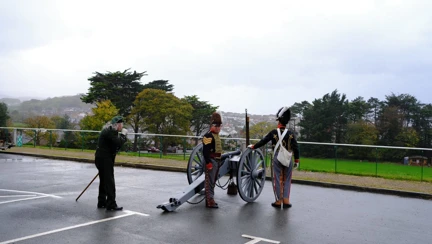 Military reenactors with a field gun outside the Llandudno Centre