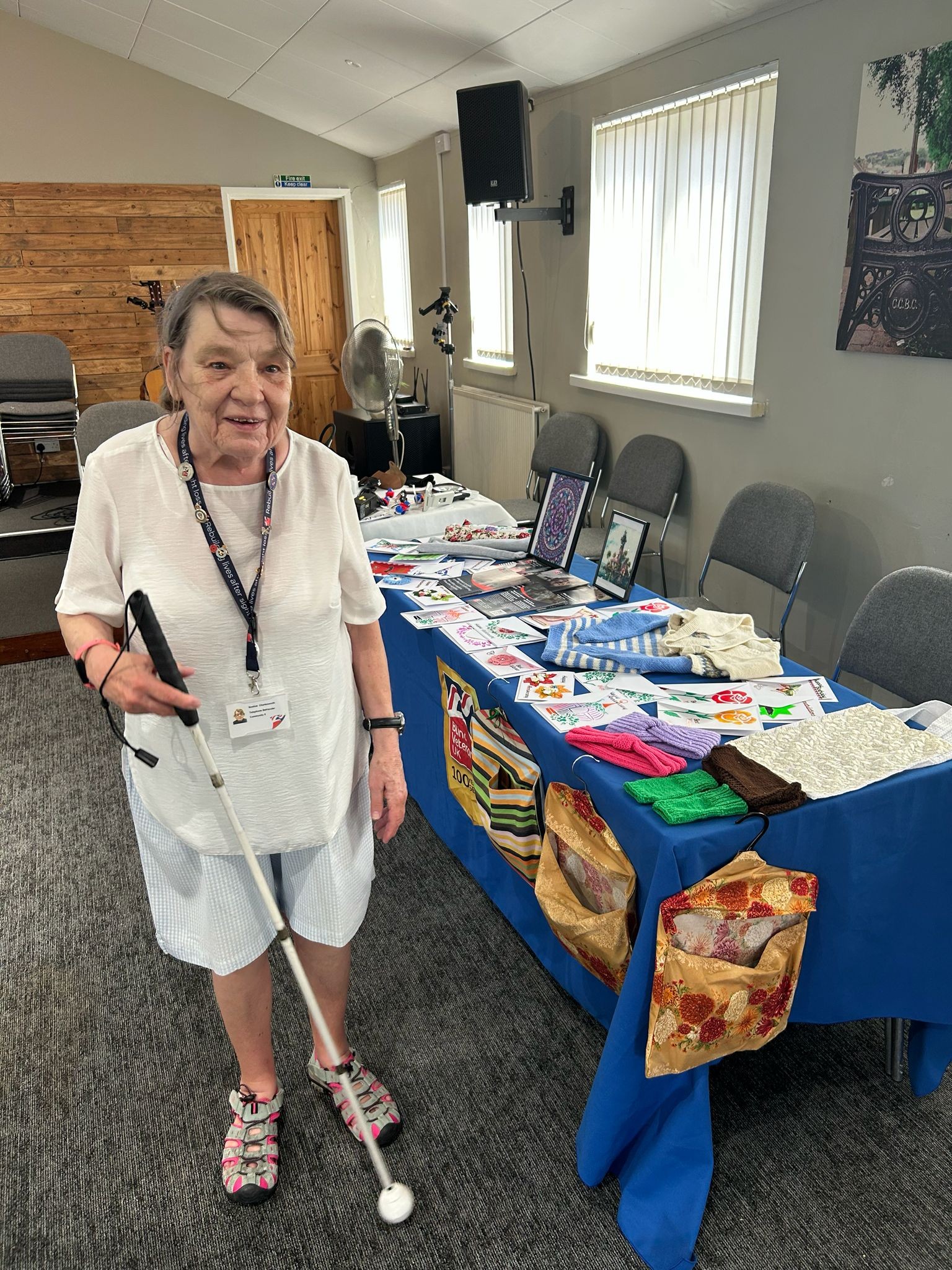 Noeline stood in front of a table with some of her crafts