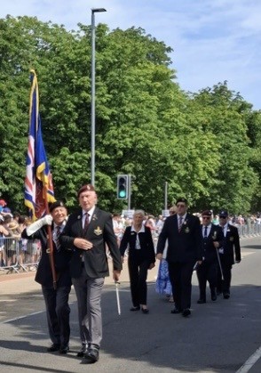 Brian holding the Blind Veterans UK standard and leading our contingent during the Armed Forces Day march