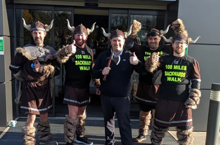 The group are ready for their challenge dressed in their viking outfits with their thumbs up