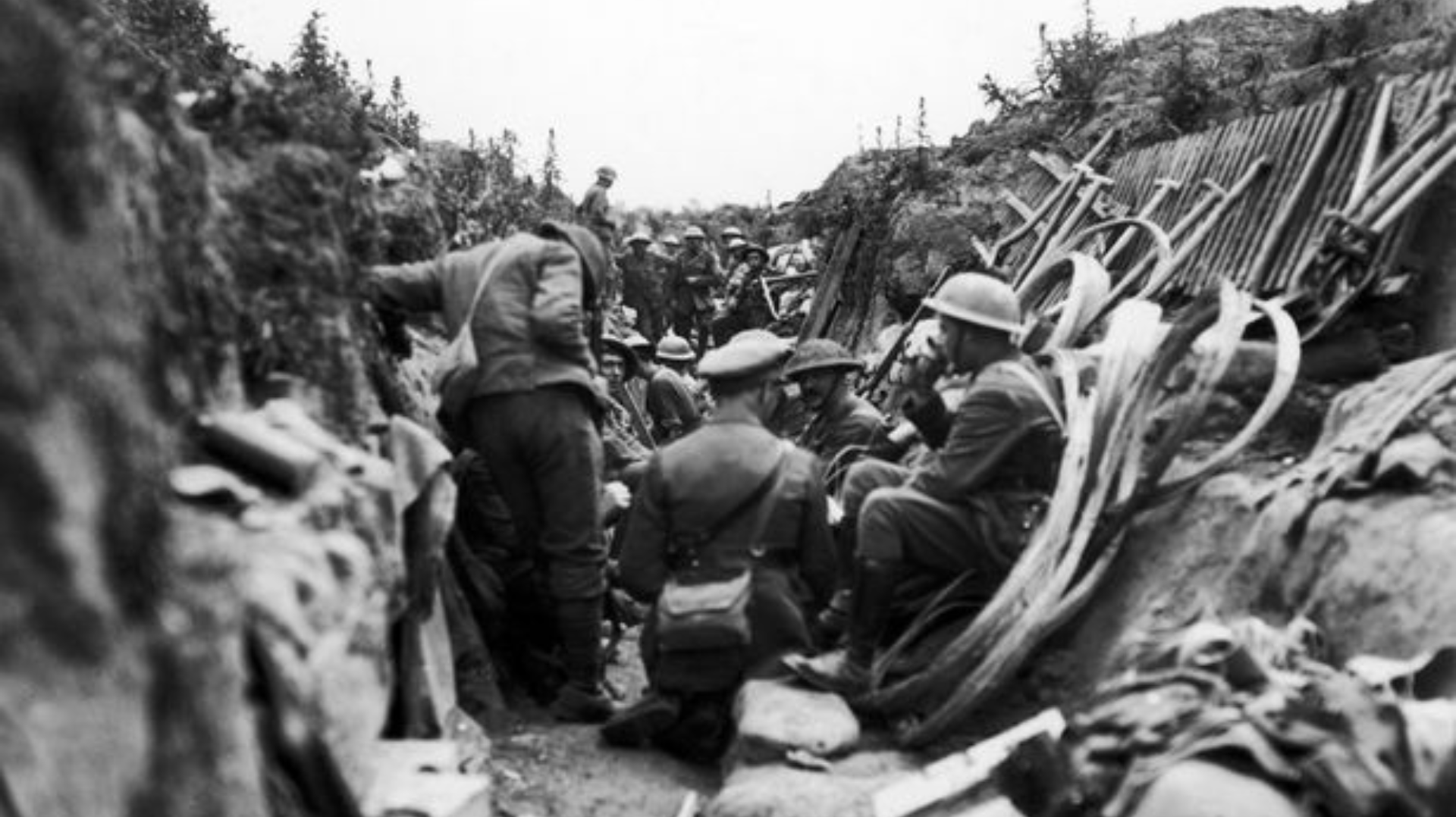 Black and white photograph of the soldiers in the trenches at the Somme during a bit of down time.