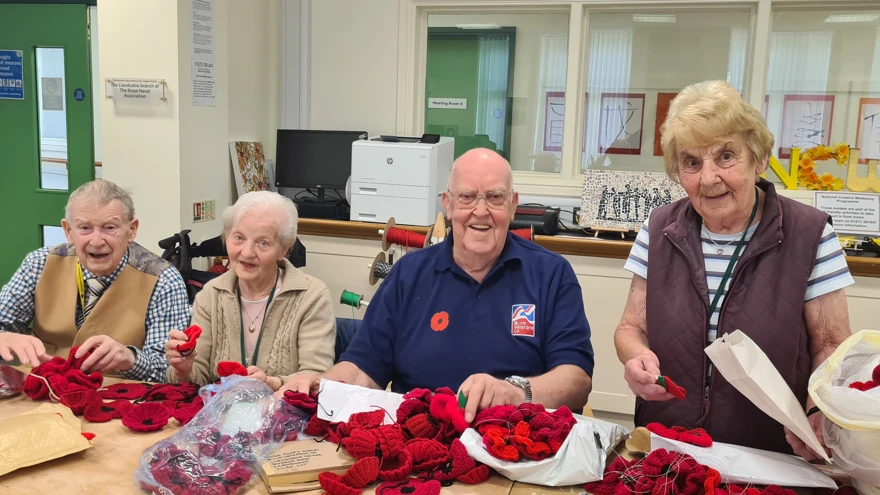 Blind veterans unpack poppies