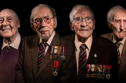 Four blind veterans Thomas, Peter, John, and Arthur edited beside each other on a black background