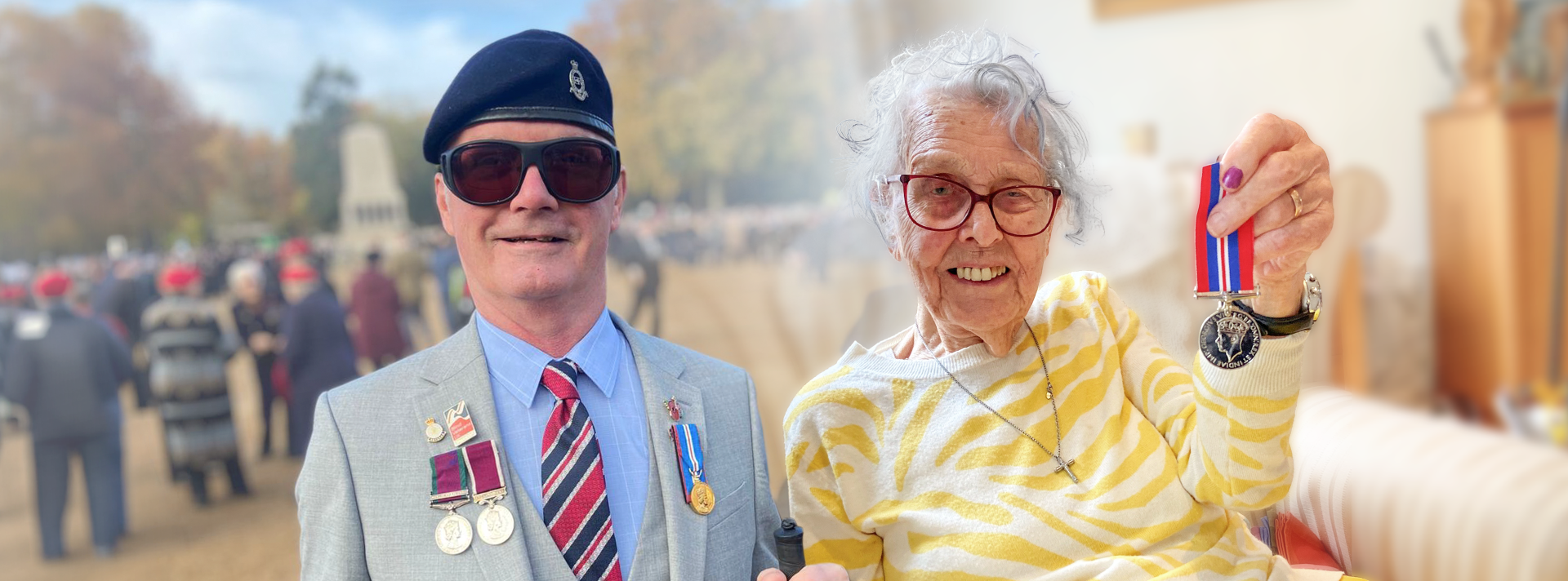 Blind veteran Mark standing and The Cenotaph edited beside blind veteran Gwynneth sat at home holding her medal