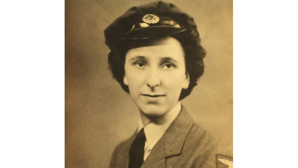 Blind veteran Margaret is in black and white and looking into camera