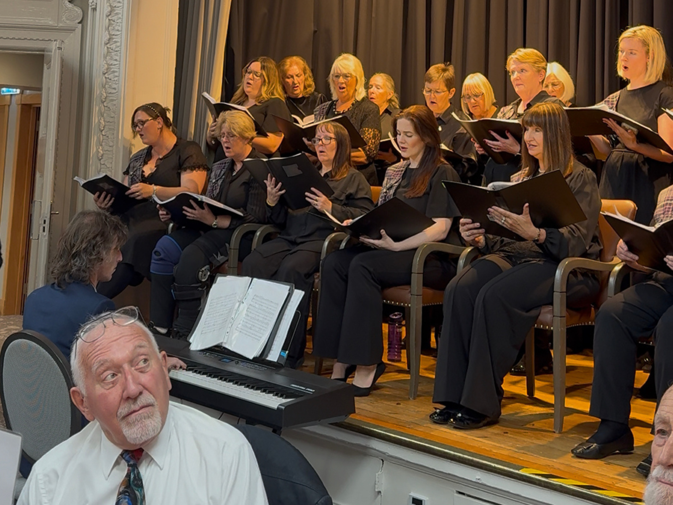 A guest listening to the choir