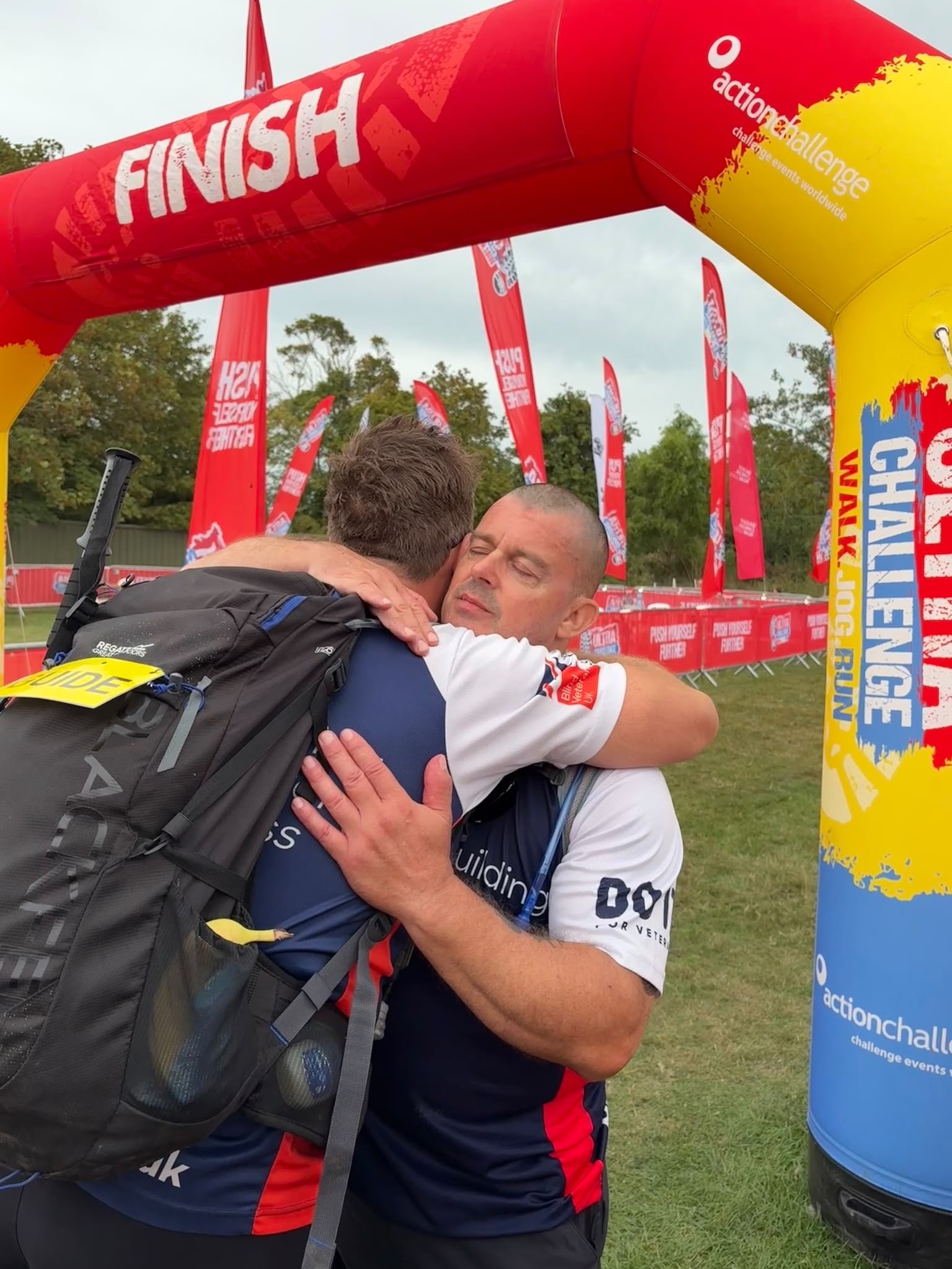 Rich and Stu hugging at the finish line