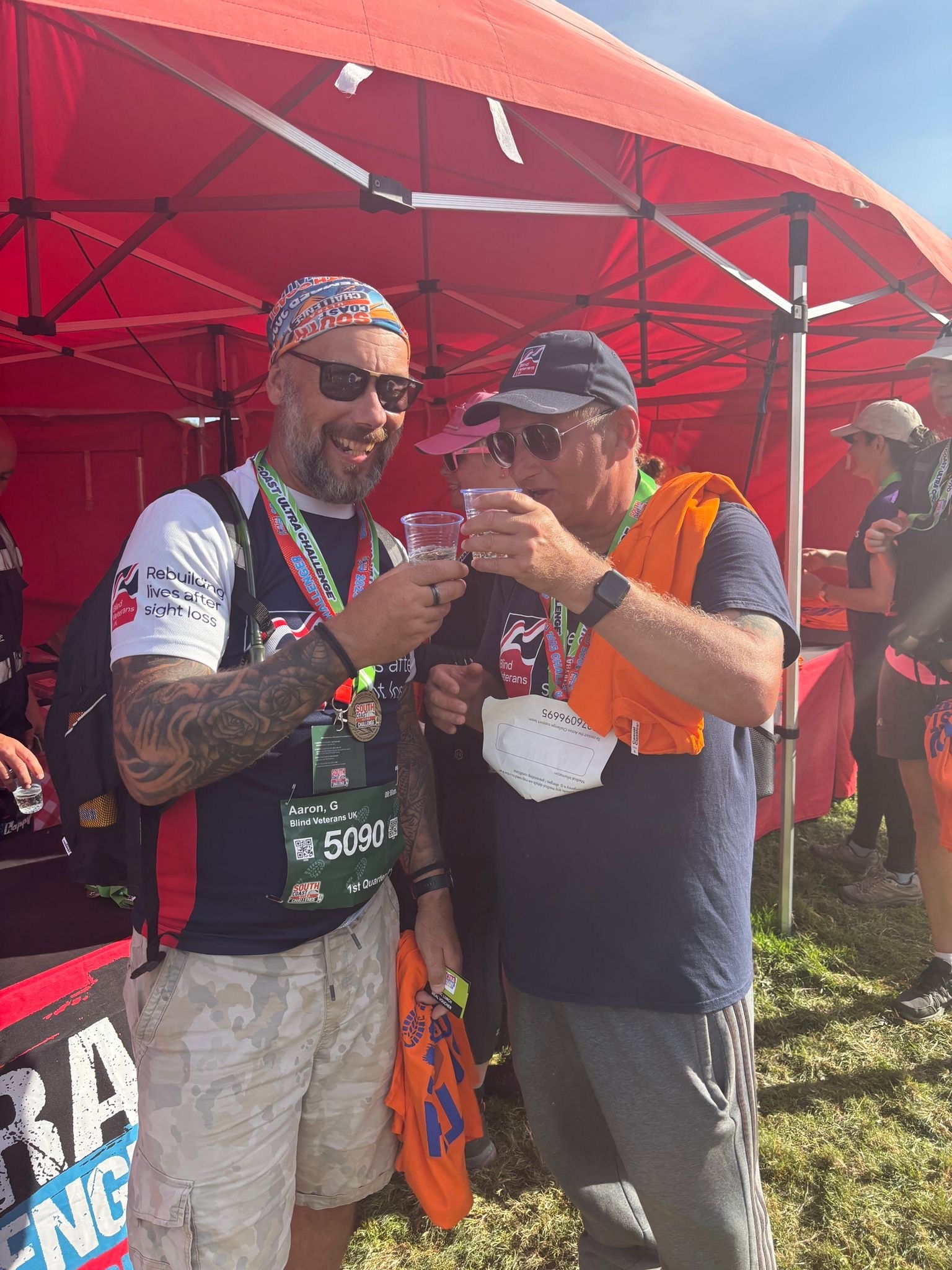 Lee and Aaron with a glass of prosecco 