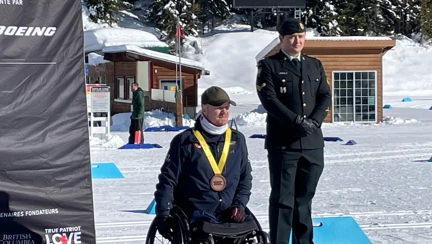 Andy Allen with medal