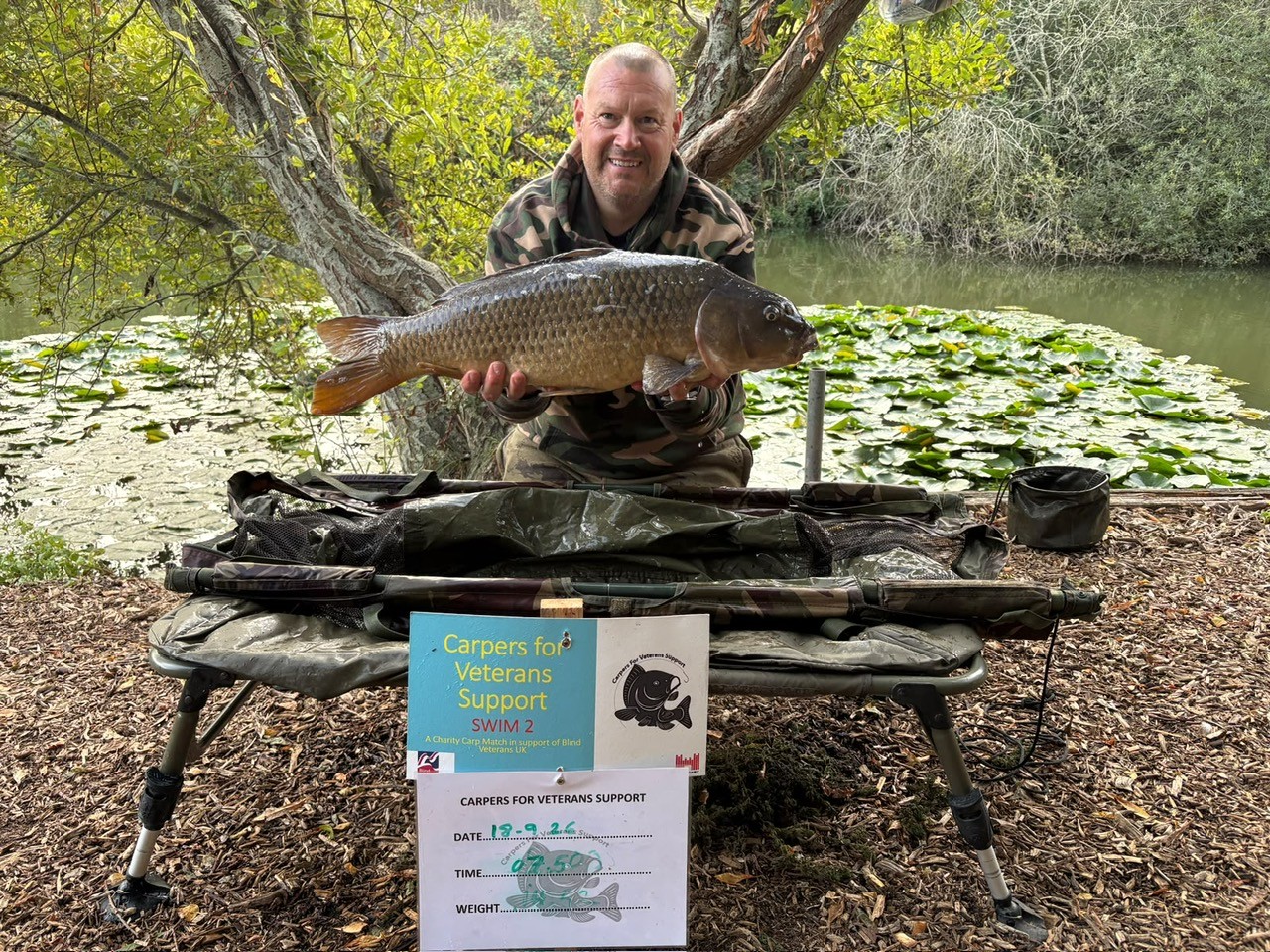 Steve knelt down with his winning catch