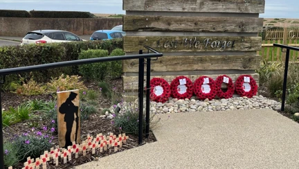 Wreaths And Crosses Laid At The Blind Veterans UK War Memorial In Rustington