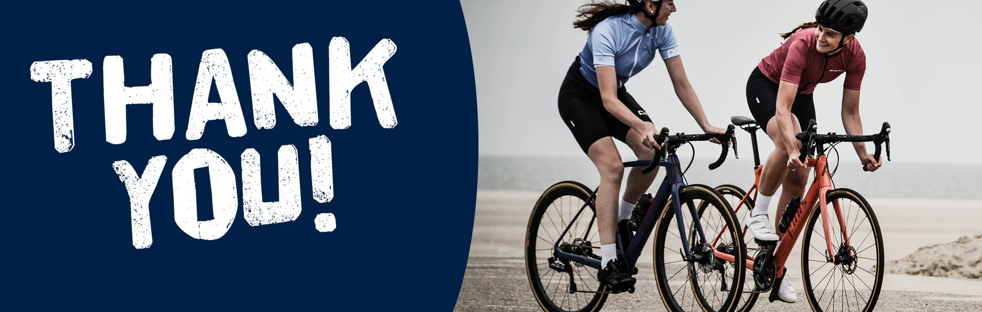 "Thank you!" A photo of two people riding bikes