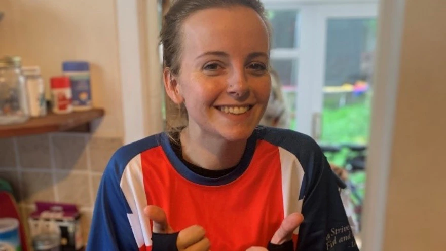 Photo of Star, fundraiser and daughter of late blind veteran Paul after finishing her ultramarathon