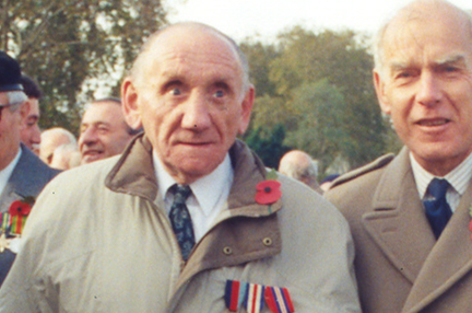 Blind veteran Fred, left, wearing a poppy at a Remembrance event