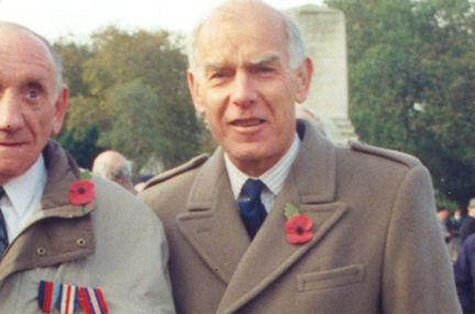 Blind veteran Fred, left, wearing a poppy at a Remembrance event