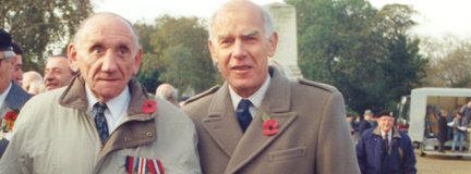 Blind veteran Fred, left, wearing a poppy at a Remembrance event