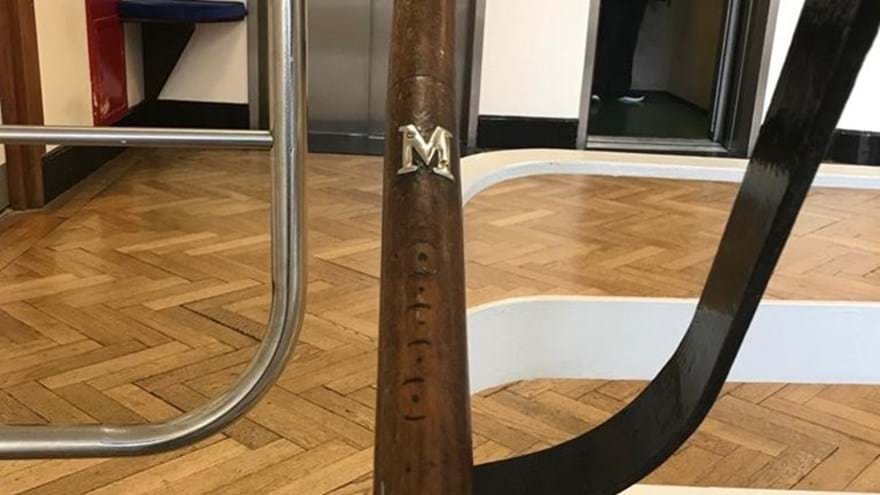 A photo of a handrail at the Brighton centre which shows special notches which provide a tactile way for blind veterans to tell which floor they are on