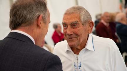 A photo of Eddie, right, chatting to Blind Veterans UK CEO Nick Caplin 