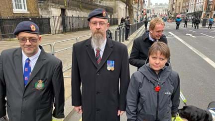 Blind veterans Kelly and Dave with Dave's brother just before the march past the Cenotaph