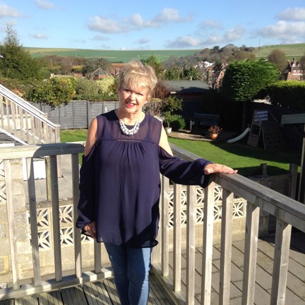 A photo of volunteer Aileen at her home