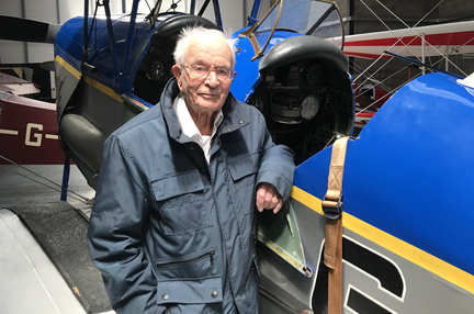 Ken stood alongside an old aircraft