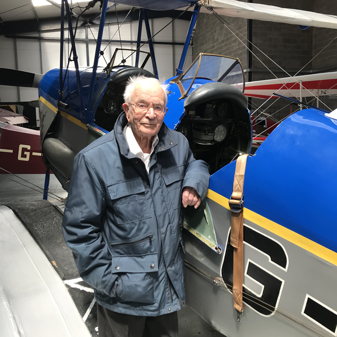 Ken stood alongside an old aircraft