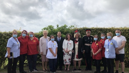 Photo of Blanche, Residential Care Manager standing with the Care Team