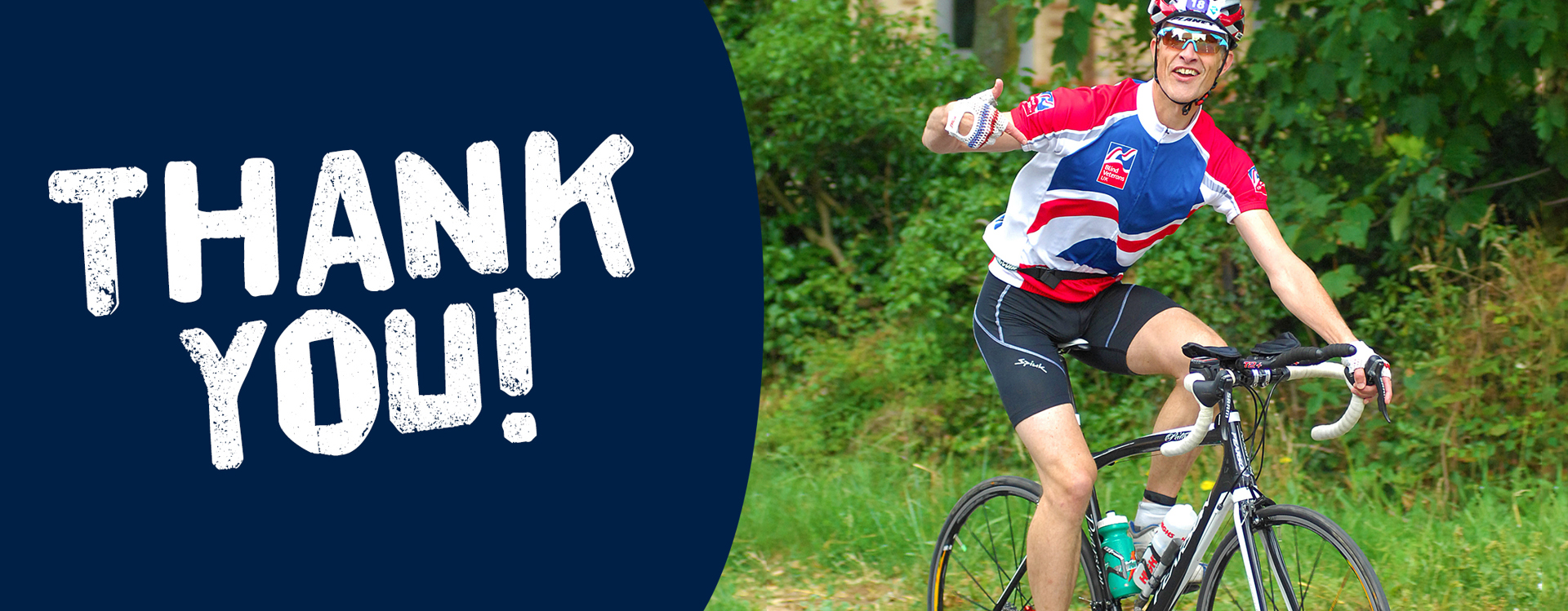 "Thank you!" A photo of a branded supporter riding a bike