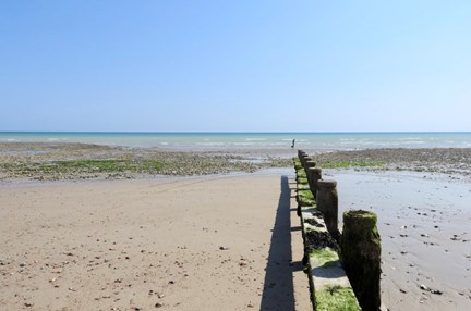 A picture of a sandy beach and the sea outside the Rustington centre