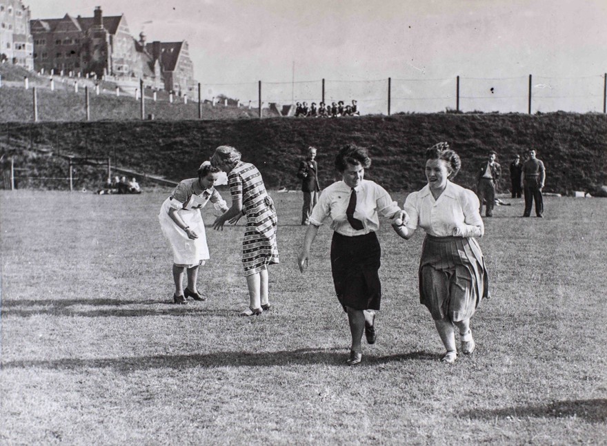 Photo of Gwen, far right, taking part in an egg and spoon race at Church Stretton