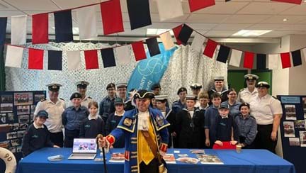 Billy stood in front of uniformed members of the Sea Cadets, Army Cadets, Air Force Cadets and scout groups