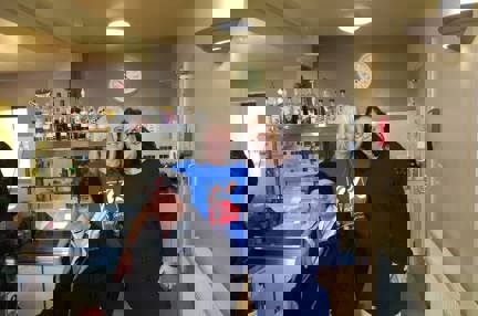 A photo showing our volunteer Jacque at The Veterans Cafe in Leyland