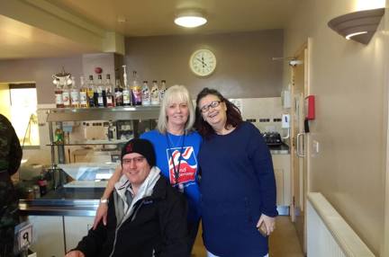 A photo showing our volunteer Jacque at The Veterans Cafe in Leyland