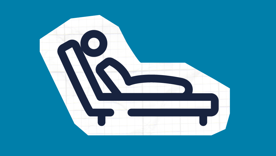 A person lying down on a sun lounger