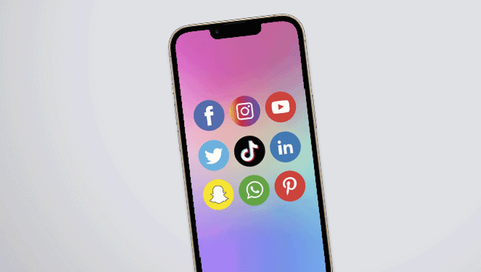 A photo of a phone with social media icons