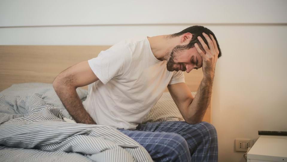 A photo of young man stressed in the morning stock photo 18 08 2022
