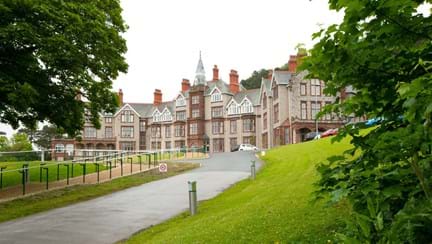 The outside of our Llandudno centre and the path leading up to it