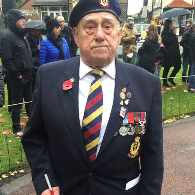 Blind veteran Bob, with his medals