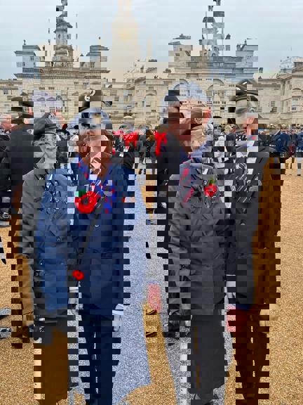 Photo of blind veteran Janet with her Great Grandson at Cenotaph 2023