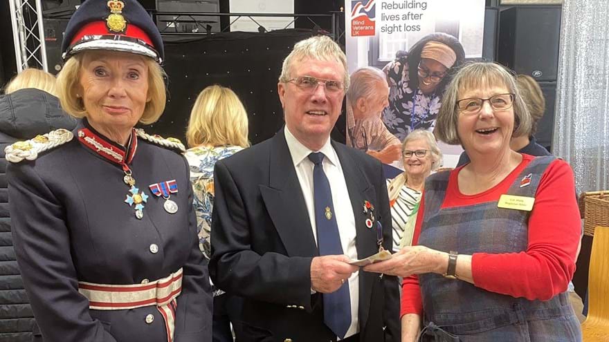 Our Rehab Officer Liz smiles as she accepts the money. The Chairman of Shirebrook Royal British Legion hands over the money. He is standing next to the Lord Lieutenant of Derbyshire.