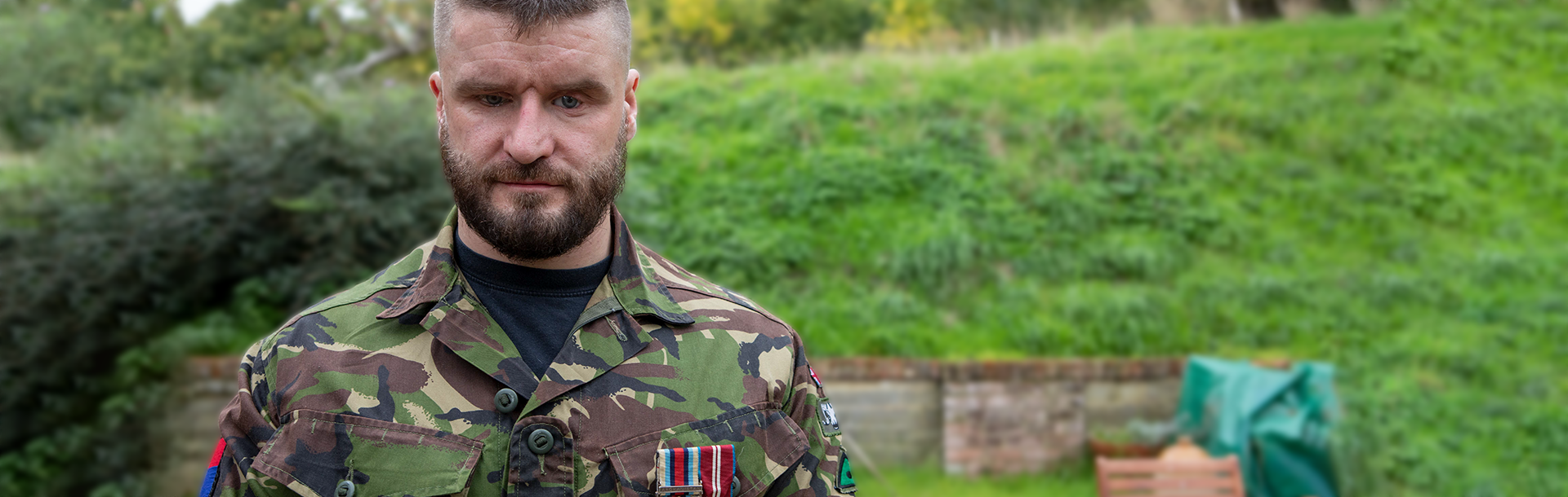 Rob, a blind veteran in uniform