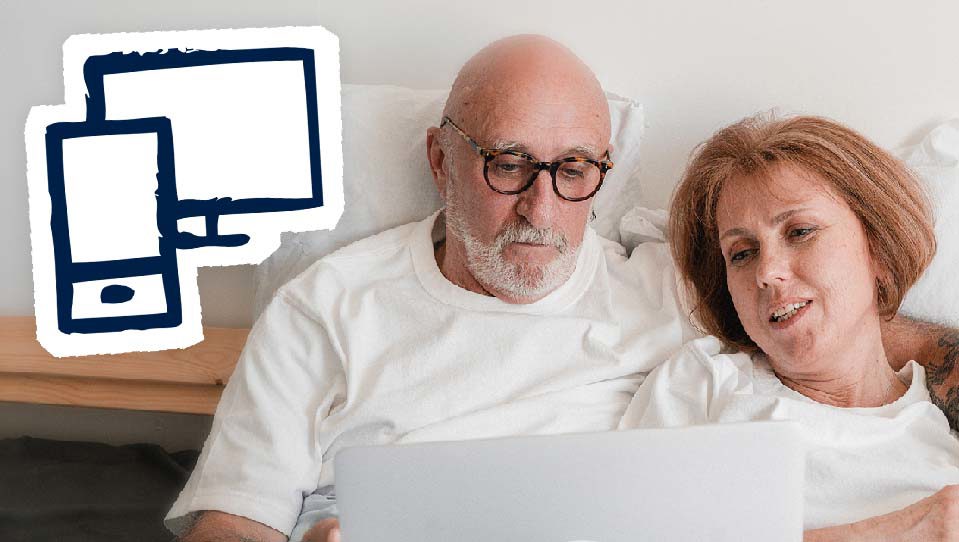 A man and woman using a laptop with a phone and computer icon next to them